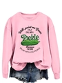 Detailed view of pink sweatshirt with pickle graphic paired with frayed denim shorts - S / Pink