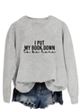 Close-up of the slogan print and knit texture on this light gray long-sleeve sweatshirt - S / Grey (Black Font)