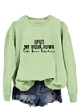Close-up of light green sweatshirt with I PUT MY BOOK DOWN text and ribbed cuffs - S / Olive Green (Black Font)