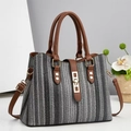 Chic large capacity striped woven handbag with brown leather straps and gold buckle - 30 x 12 x 23cm / Black