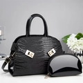 Glossy black crocodile pattern tote bag set with golden hardware and matching pouch - Black