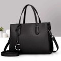 Black pebbled leather tote bag with silver C charm and detachable long shoulder strap - Black