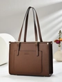 Minimalist brown tote bag in pebbled leather with top handles and front pocket - Coffee