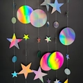 Close-up of iridescent star and circle paper garland for party wall hanging decoration - AB Color
