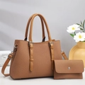 Detail of tan textured handbag set with matching coin purse and woven surface - Earthy Yellow