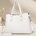 Detail of white lychee pattern crossbody bag with silver rivets and metal hardware - Off-white