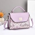 Fashionable purple crossbody bag with floral embroidery and golden swan buckle detail - 22.5x10x17cm / Purple
