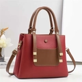 Deep red pebbled leather tote bag with brown handles and adjustable shoulder strap - Red