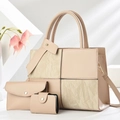 Detailed view of beige 3-piece bag set with patchwork textures and round metal magnetic clasp - Three-Piece Set / Khaki