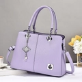 Elegant lavender litchi pattern leather handbag with pearl pendant and bird logo - Purple / 30x13x21cm