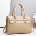 Detail of lychee pattern leather tote bag with golden twist lock and adjustable strap - Khaki
