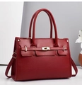 Elegant burgundy leather tote bag with classic metal turn-lock and adjustable strap - Red
