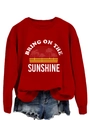 Detail view of Bring On The Sunshine graphic print on red long sleeve cotton sweatshirt - S / Tops / Bright Red (White Print)