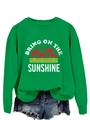 Detail of green crewneck sweatshirt with 'Bring On The Sunshine' sunset graphic design - S / Tops / Grass Green (White Print)