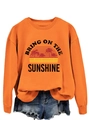Detail of sun and palm tree print on orange cotton blend sweatshirt with retro text - Orange (Black Print)