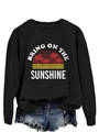 Close-up of Bring On The Sunshine vintage sunset print on black crewneck sweatshirt - Black (White Print)