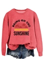 Detail of coral pink sweatshirt with Bring On The Sunshine print and frayed denim shorts - Red (Black Print)