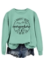 Detail of mint green sweatshirt with mountain print and ribbed cuffs for a casual look - Light Green (Black Print)