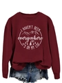 Close-up of travel slogan print on burgundy crewneck sweatshirt with mountain graphics - Wine Red (White Print)