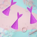 Three purple sequin mermaid party hats with fish tail tops and elastic chin straps - Purple Glitter Mermaid Tail Paper Hat