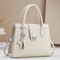 Beige lychee pattern leather handbag with silver buckle and star charm for women - Off White
