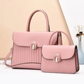 Détail du lot de sacs cabas rose avec fermoir doré élégant et texture côtelée - Rose