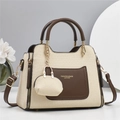 Detalle de textura tejida crema y bolsillo de cuero marrón en el bolso bandolera - L26cm A12cm A20cm / Blanco Roto
