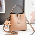 Elegant khaki bucket bag with smooth leather texture and cute cloud charm accessory - L19 W12 H19 / Khaki