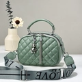 Olive green quilted crossbody bag with bear pendant and wide 'LOVE' shoulder strap - Green