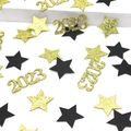Detail of 2023 gold glitter numbers and black star confetti for New Year table decor - Black Gold Star and Gold Glitter 2026 Confetti