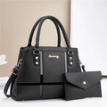 Schwarze Handtasche und Set mit kleiner Clutch aus strukturiertem Leder mit Goldbeschlägen - Schwarz