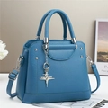Blue lychee pattern leather handbag with silver star pendant and adjustable strap - L25 W11 H21 / Blue