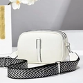 Close-up of white triple-layer crossbody bag with textured leather and striped strap - 21*8*14 / Off White