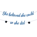 Blue glitter graduation banner reading She Believed She Could with black mortarboard icons - Black Glitter Hat + Blue Glitter Script Font