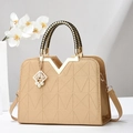 Elegant khaki structured handbag with geometric pattern and woven top handle - Gold