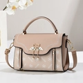 Elegant pink crossbody bag with swan pendant and floral print on high-quality leather - Khaki