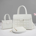 Detailed view of white leather tote bag 3-piece set with embossed texture and accessories - Three-Piece Set / White