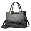 Chic black crocodile embossed leather handbag for women with shiny finish and crossbody strap - Black