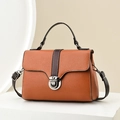 Caramel brown pebbled leather crossbody bag with silver rotating clasp and top handle - Yellow