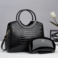 Detail of black crocodile texture handbag set with gold hardware and small clutch - Shoulder Bag Set / Black