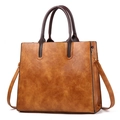 Caramel tote bag with contrast brown handles and adjustable strap in textured faux leather - 32x15x26cm / Yellow
