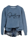 Detail of blue crewneck sweatshirt featuring black Skating LIFE text and heart graphic - S / Blue (Black Font)