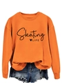 Detail of orange Skating Life sweatshirt featuring black heart print and crew neck style - S / Orange (Black Font)