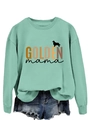 Detail of mint green sweatshirt featuring Golden Mama print and drop shoulder sleeves - Light Green Sweatshirt (Black Text)