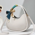 Chic white crescent handbag in pebble leather with silk scarf handle and pearl charms - Off-white