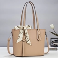 Detail of beige tote bag in cross-grain leather with decorative silk scarf and long strap - Light Khaki