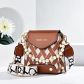 Brown and white plaid crossbody bag with pearl handle and wide graphic strap - Earthy Yellow