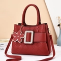Large capacity red quilted leather tote bag with rhinestone buckle and floral charm - Red