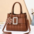 Brown leather tote bag with rhinestone buckle and floral pendant in a stylish setting - Khaki/Earth Yellow