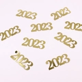 Sparkling gold 2023 number confetti for New Year party tabletop decoration - Gold Card 2026 Confetti